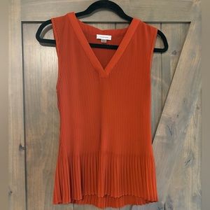 Calvin Klein rust sleeveless top.